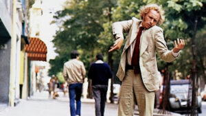 The Tall Blond Man with One Black Shoe